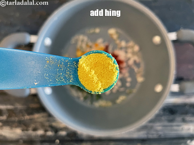 Step 28 – Add&nbsp;<meta charset="UTF-8" />a pinch of&nbsp;<a href="glossary-asafoetida-hing-113i">asafoetida (hing)</a>. We used 1/4 tsp hing.