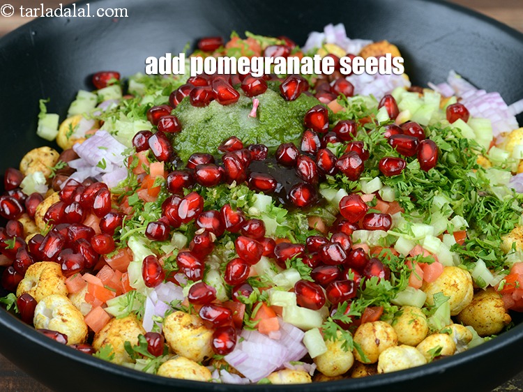 Step 29 – Add &frac14; cup <a href="https://www.tarladalal.com/glossary-pomegranate-seeds-anar-dana-anardana-seeds-588i">pomegranate seeds (anardana)</a>.