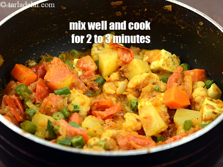 Step 33 – Mix well and cook on a medium flame for another 2 to 3 minutes, while …