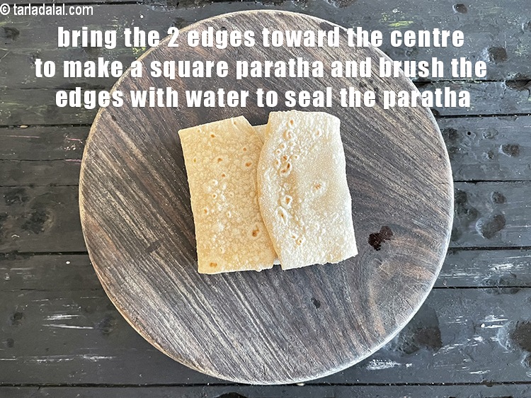 Step 47 – Bring in 2 &nbsp;edges of the chapati towards the centre to enclose the filling and …