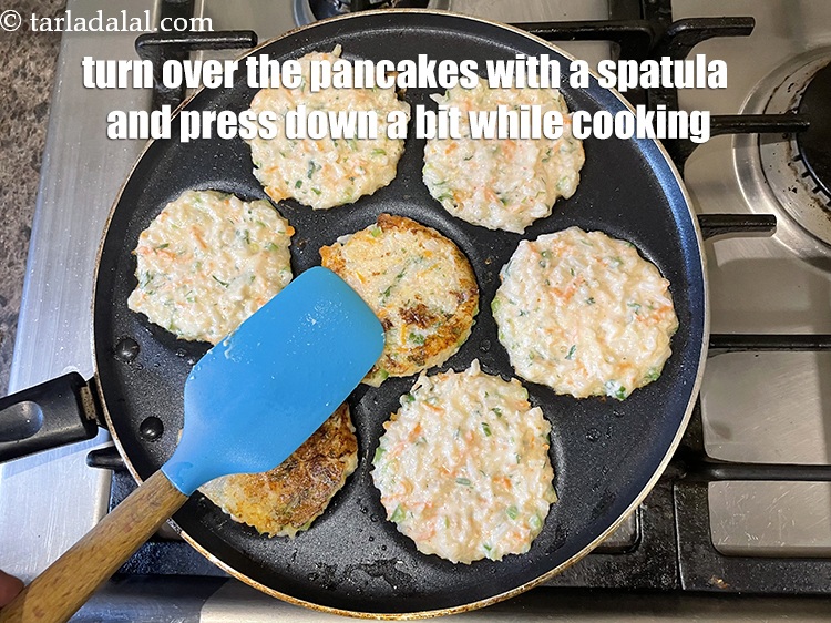 Step 28 – Turn over the pancakes with the help of a spatula. Makes it easier to flip.