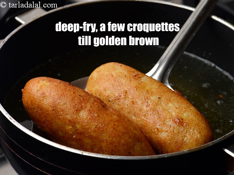 स्टेप 30 – एक बार में कुछ क्रोकेट्स डालकर मध्यम आंच पर तब …