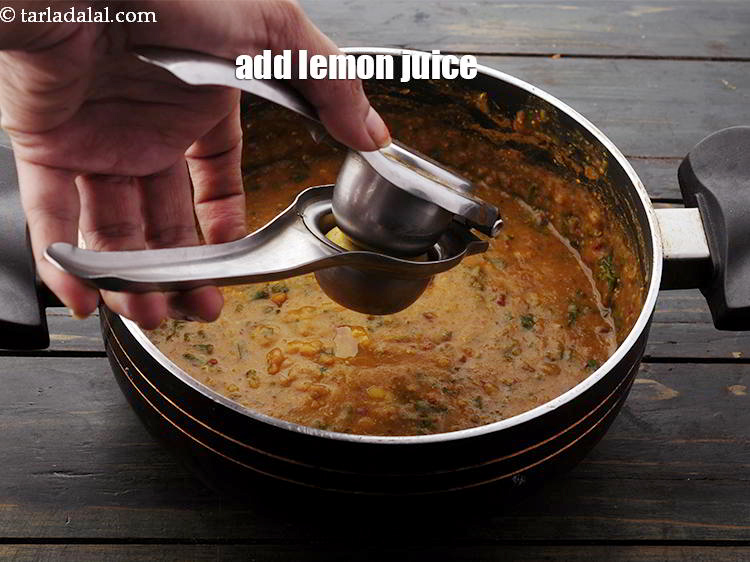 Step 42 – Switch off the flame, add the <a href="https://www.tarladalal.com/glossary-lemon-nimbu-428i#ing_471" target="_blank">lemon juice</a>.