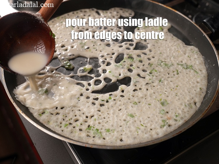 Step 29 – Pour the batter using a ladle from the edges to the centre.