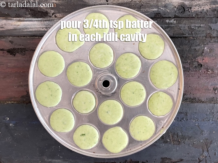 Step 29 – Pour a little batter into each greased mini idli mould, about 3/4th&nbsp;tsp of batter. Note …