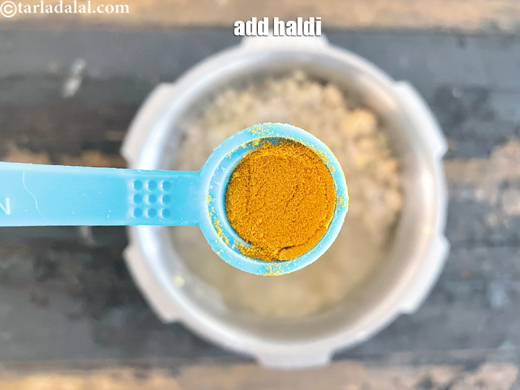 Step 35 – Add&nbsp;<meta charset="UTF-8" />1/4 tsp&nbsp;<a href="glossary-turmeric-powder-haldi-645i">turmeric powder (haldi)</a>.