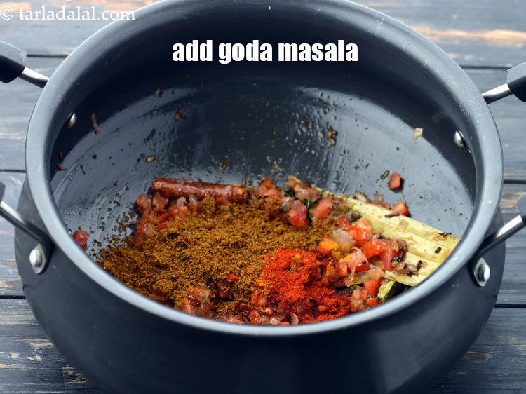 Step 29 – Add 1 tbsp&nbsp;<a href="https://www.tarladalal.com/glossary-goda-masala-1091i">goda masala</a>.&nbsp;