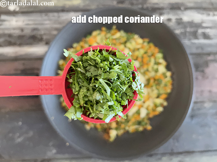 Step 27 – Add&nbsp;<meta charset="UTF-8" />2 tbsp&nbsp;finely&nbsp;<a href="glossary-chopped-coriander-783i">chopped coriander (dhania)</a>.