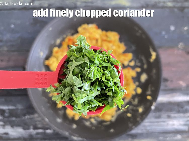 Step 29 – Add&nbsp;<meta charset="UTF-8" />2 tbsp&nbsp;finely&nbsp;<a href="glossary-chopped-coriander-783i">chopped coriander (dhania)</a>.