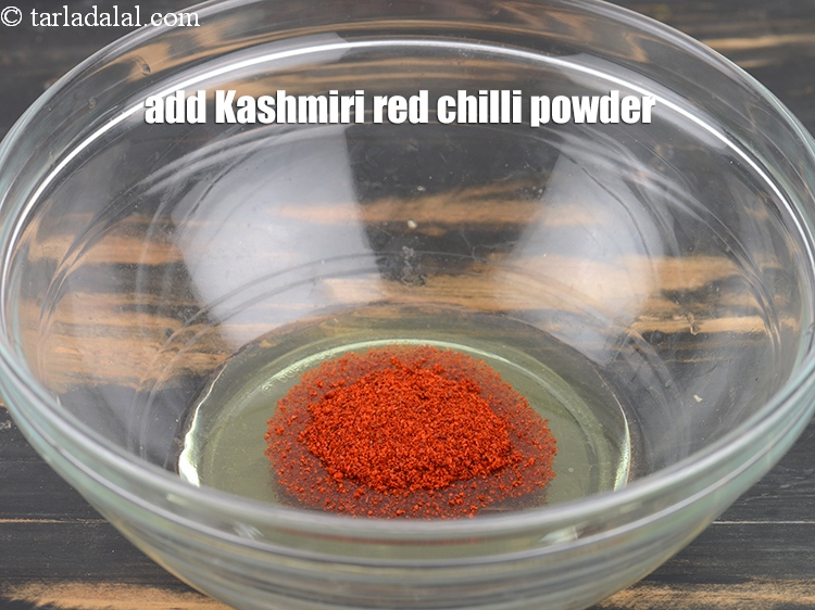 Step 30 – Add 1 tsp&nbsp;<a href="https://www.tarladalal.com/glossary-kashmiri-red-chilli-powder-kashmiri-mirch-powder-2684i">kashmiri red chilli powder</a>.&nbsp;