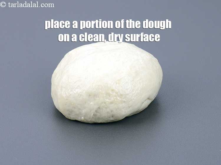 Step 28 – Place a portion of the dough on a clean, dry surface.