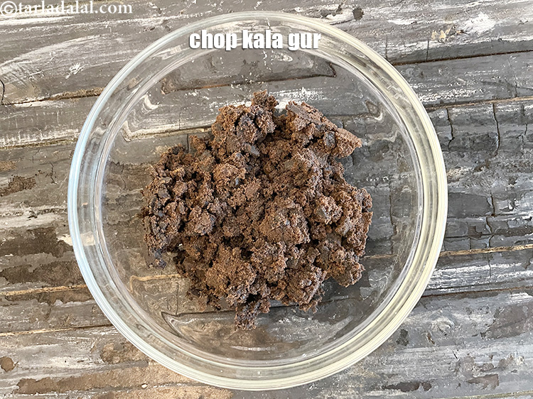 Step 33 – <p>Chop the 1 cup kala gur (jaggery) and put in a glass bowl.</p>