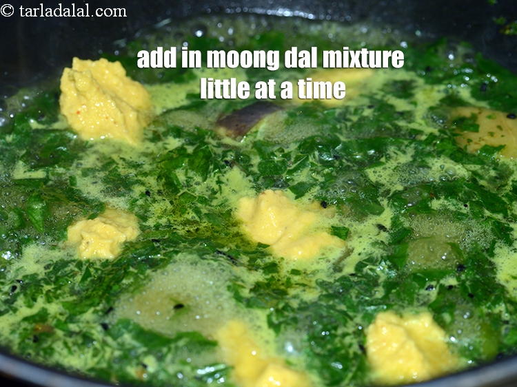Step 26 – Add in the moong dal mixture little at a time using your fingertips to form …