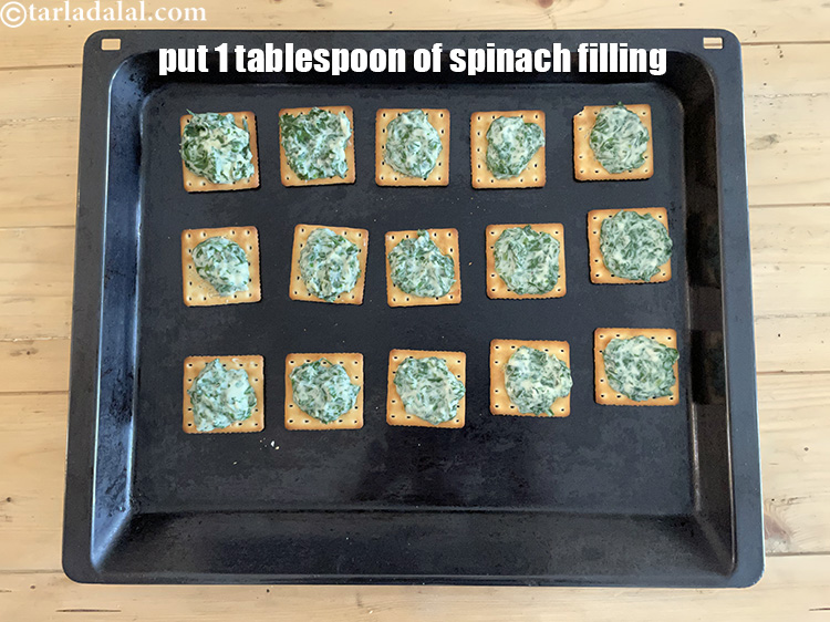 Step 42 – Put 1 tbsp of the spinach filling on each cream cracker biscuit.