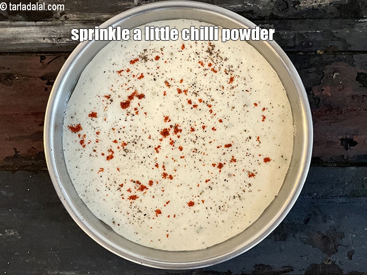 Step 28 – Sprinkle a little chilli powder over it.