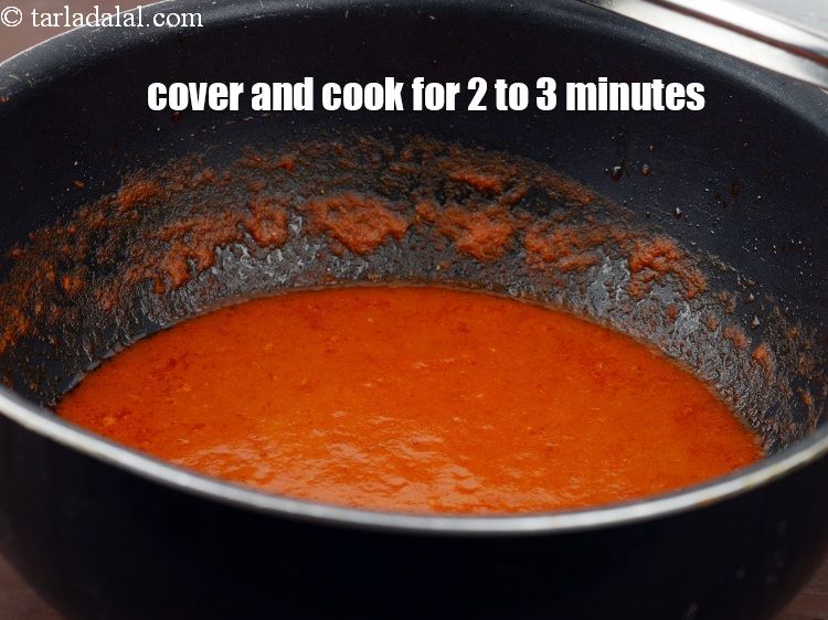 Step 29 – Cover and cook for 2 to 3 minutes till oil releases.