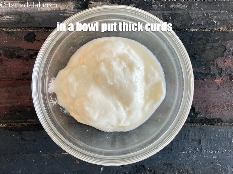 Step 36 – In a bowl put&nbsp;<meta charset="UTF-8" />1/2 cup&nbsp;fresh thick&nbsp;<a href="glossary-low-fat-curds-low-cal-dahi-low-calorie-curd-low-fat-yogurt-1107i">low fat curds (dahi)</a>.