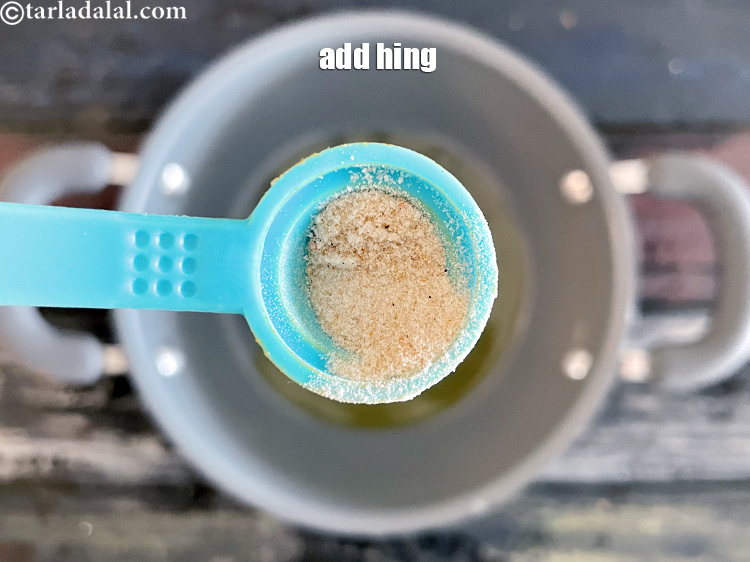 Step 29 – Add&nbsp;<meta charset="UTF-8" />a pinch of&nbsp;<a href="glossary-asafoetida-hing-113i">asafoetida (hing)</a>.