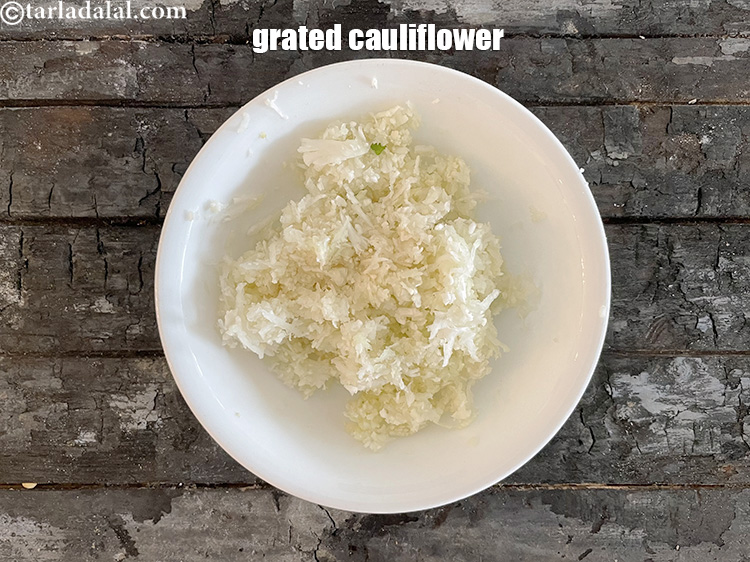 Step 55 – Keep aside grated cauliflower in a bowl.