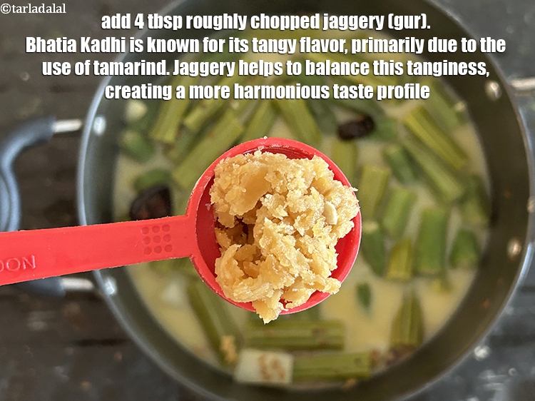 स्टेप 29 – ४ टेबल-स्पून&nbsp;<a href=""https://www.tarladalal.com/glossary-chopped-jaggery-hindi-946i"">कटा हुआ गुड़</a>&nbsp;डालें। भाटिया कढ़ी अपने खट्टे स्वाद …