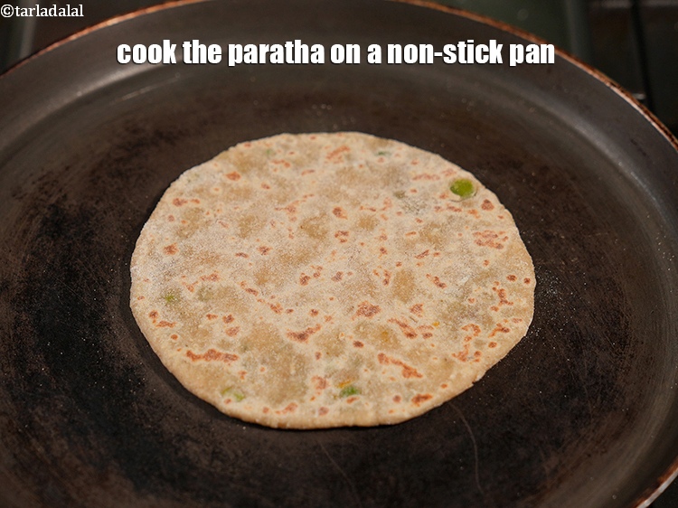 Step 30 – Cook the paratha on a non-stick pan.