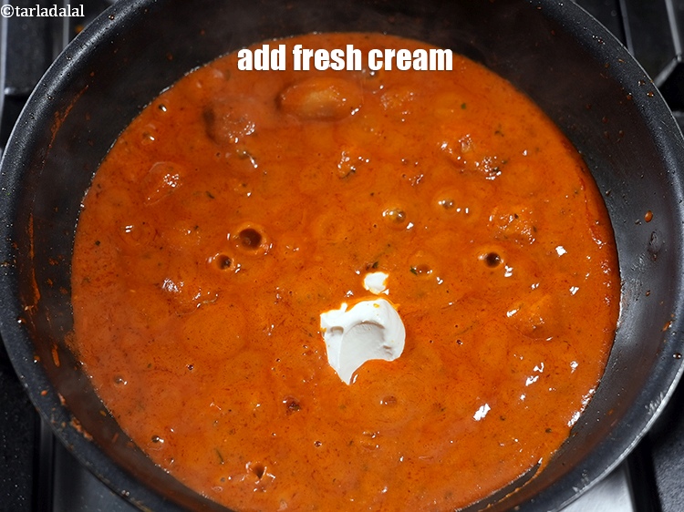 Step 29 – Add 2 tbsp <a href="https://www.tarladalal.com/glossary-fresh-cream-1877i">fresh cream</a>.