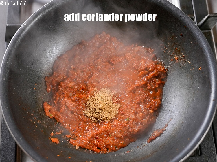 Step 28 – Add &frac12; tsp&nbsp;<a href="https://www.tarladalal.com/glossary-coriander-powder-dhania-powder-370i">coriander (dhania) powder</a>.