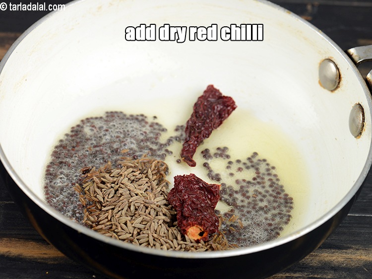 Step 30 – Add 1 dry red chillies.&nbsp;
