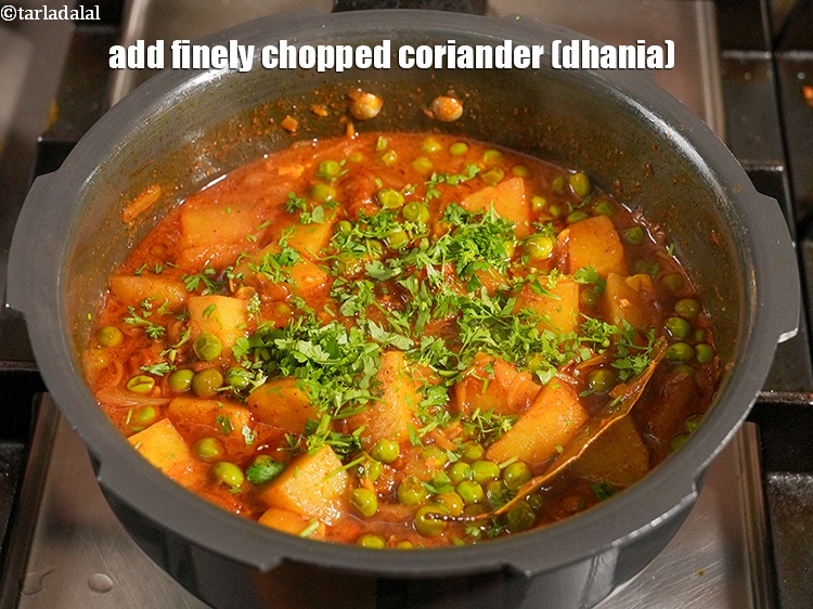 Step 30 – Add&nbsp;finely&nbsp;<a href="https://www.tarladalal.com/glossary-chopped-coriander-783i">chopped coriander (dhania)</a>.