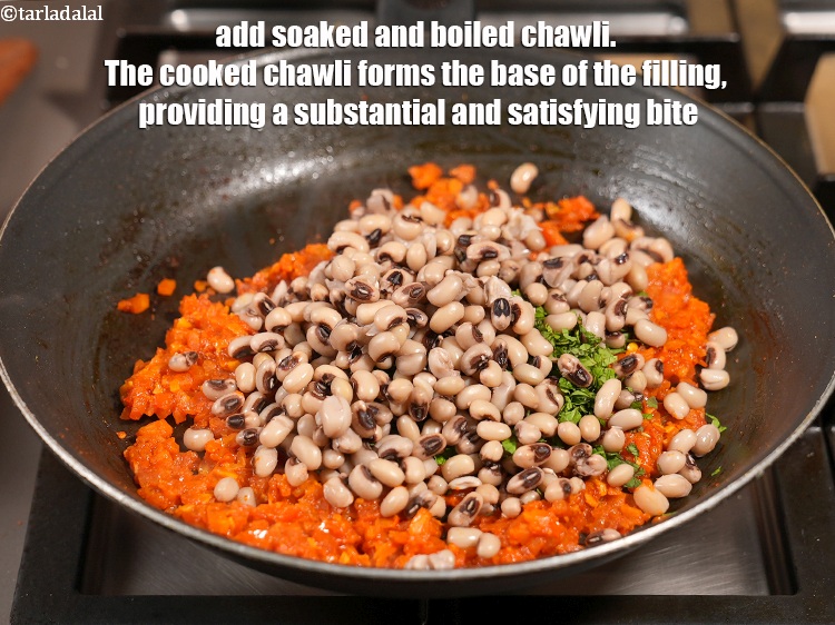 Step 29 – Add 1 cup soaked and <a href="https://www.tarladalal.com/glossary-boiled-chawli-1784i">boiled chawli (cow pea / lobhia)</a>. The cooked chawli …