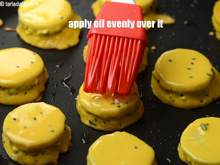 Step 30 – Apply &frac12; tsp oil evenly over it and turn over.