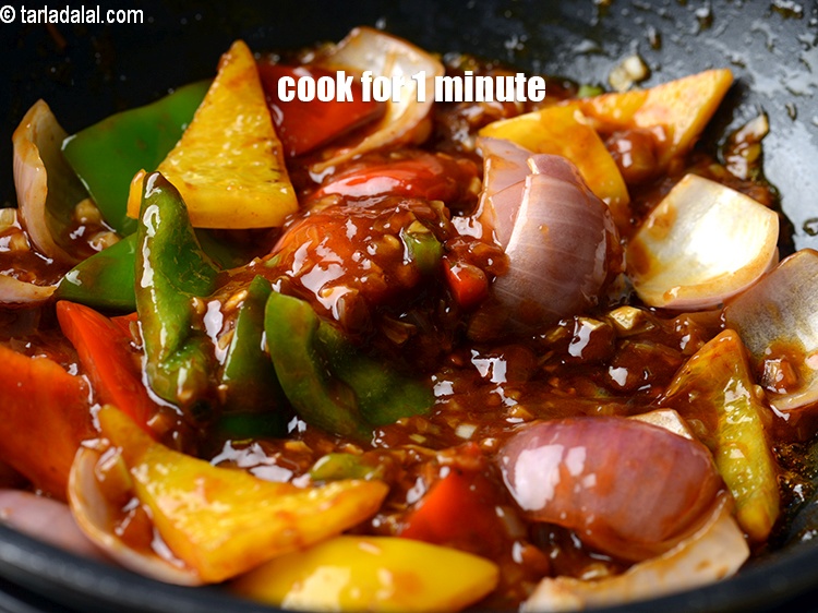 Step 30 – Cook on a medium flame for 1 minute.&nbsp;