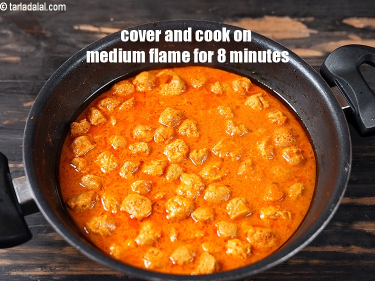 Step 29 – Mix well and cover and cook on medium flame for 8 minutes.
