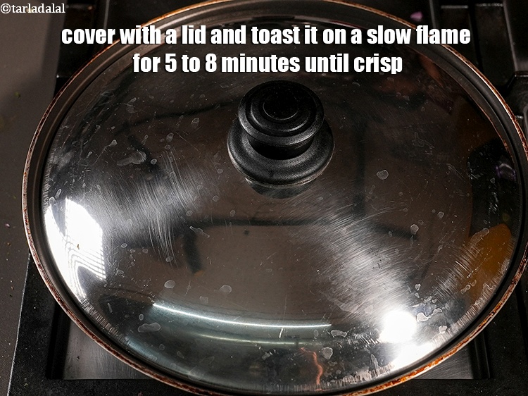 Step 29 – Cover with a lid and toast it on a slow flame for 5 to 8 …