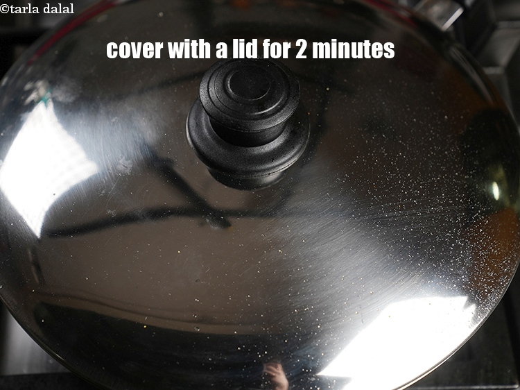 Step 29 – Cover with a lid for 2 minutes until the cheese melts.