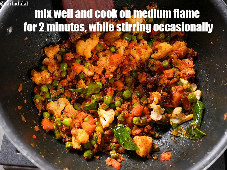 Step 29 – Mix well and cook on medium flame for 2 minutes, while stirring occasionally.