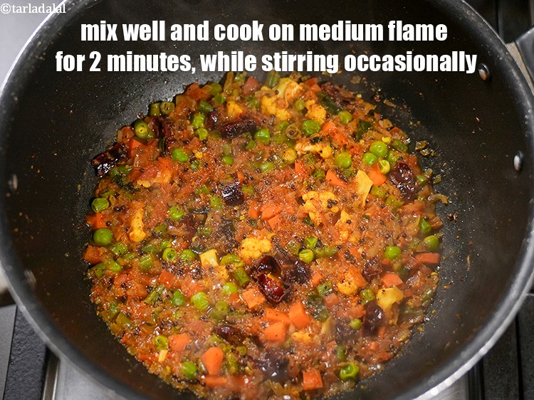 Step 29 – Mix well and cook on medium flame for 2 minutes, while stirring occasionally.