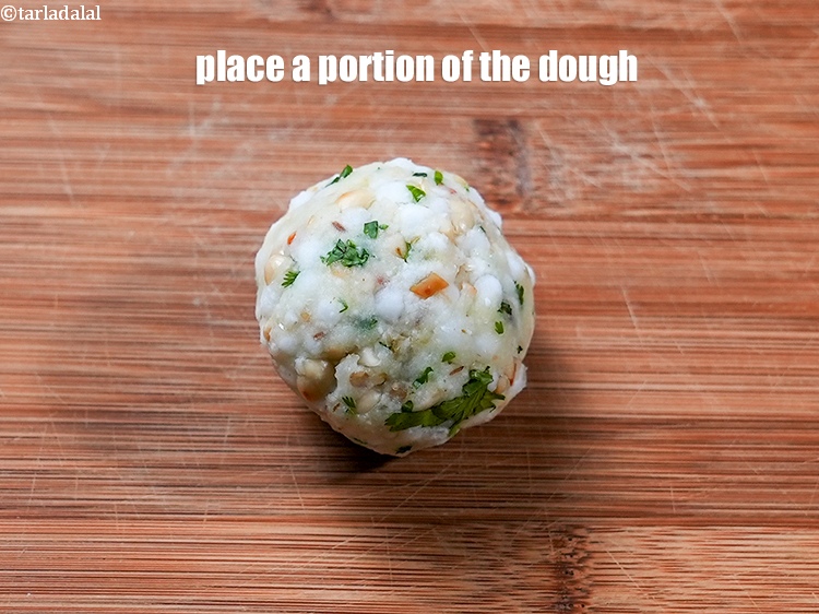 Step 29 – Place a portion of the dough.&nbsp;
