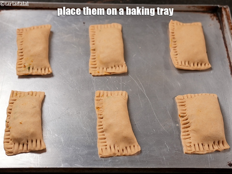 Step 29 – Place them on a baking tray.