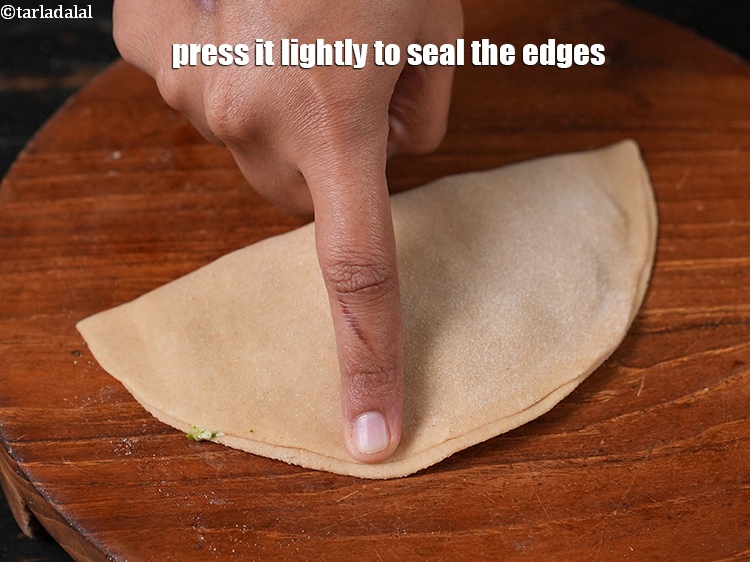 Step 28 – Press it lightly to seal the edges.