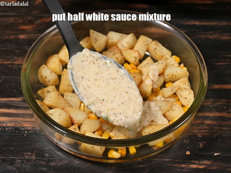 Step 29 – Put half white sauce mixture.