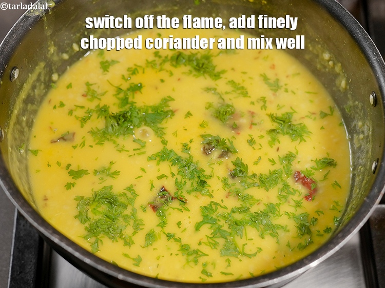 Step 29 – Switch off the flame, add 1 tbsp finely <a href="https://www.tarladalal.com/glossary-chopped-coriander-783i">chopped coriander (dhania)</a> and mix well.