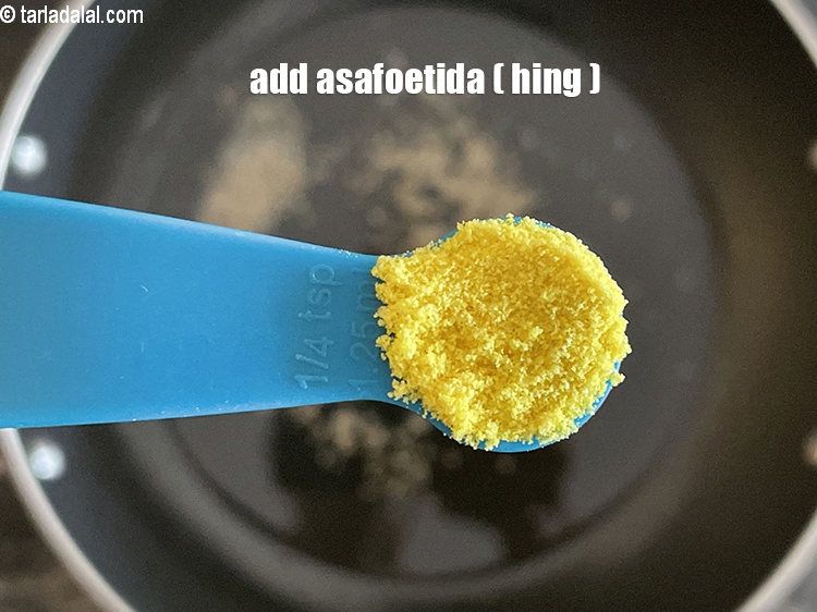 Step 32 – Add&nbsp;<meta charset="UTF-8" />1/4 tsp&nbsp;<a href="glossary-asafoetida-hing-113i">asafoetida (hing)</a>.