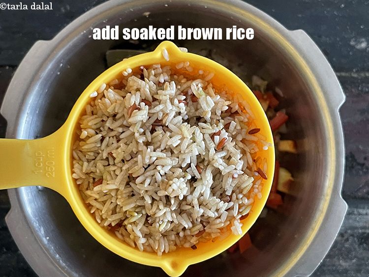 Step 29 – Add soaked brown rice.&nbsp;