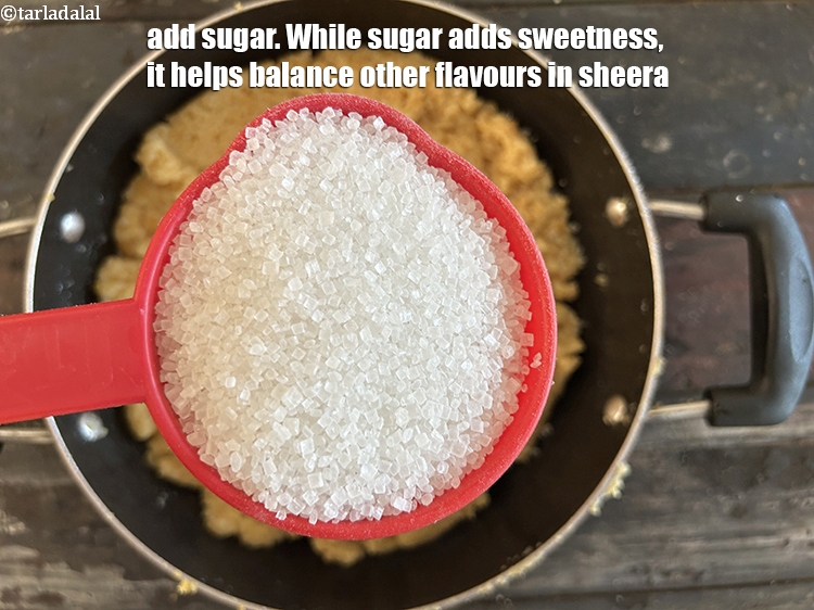 स्टेप 29 – १ १/२ कप&nbsp;<a href=""https://www.tarladalal.com/glossary-sugar-chini-shakkar-hindi-278i"">शक्कर</a>&nbsp;डालें। जबकि चीनी मिठास जोड़ती है, यह …