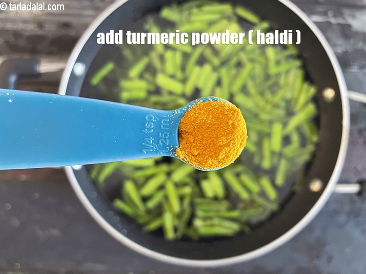 Step 29 – Add&nbsp;<meta charset="UTF-8" />1/4 tsp&nbsp;<a href="glossary-turmeric-powder-haldi-645i">turmeric powder (haldi)</a>.
