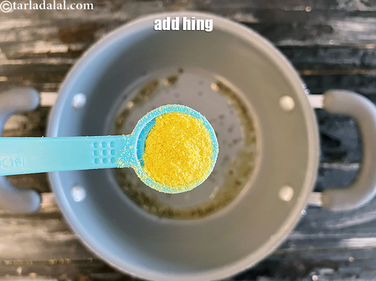 Step 37 – Add 1/2 tsp&nbsp;<a href="glossary-asafoetida-hing-113i">asafoetida (hing)</a>.