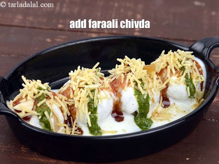 Step 30 – Add 1 tbsp <a href="https://www.tarladalal.com/glossary-faraali-chivda-1916i">faraali chivda</a>.