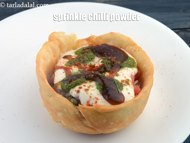 Step 31 – Sprinkle chilli powder.