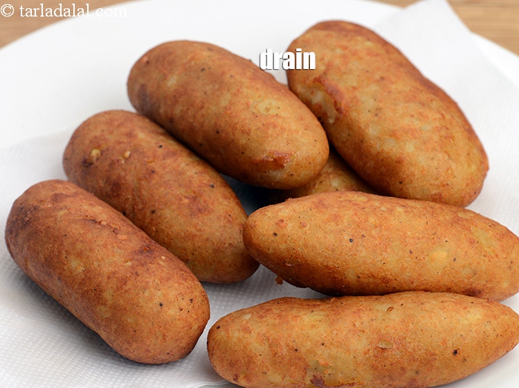 स्टेप 31 – एक सोखने वाले कागज पर निकालें।